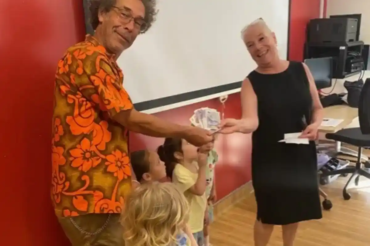 jill hands over money raised